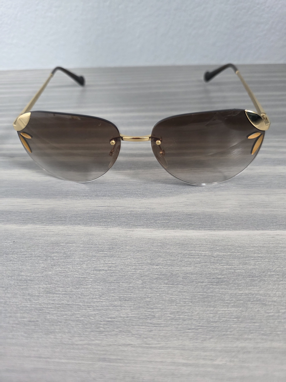 Authentic Louis Vuitton Brown Gradient Rimless Sunglasses with Gold Accents
